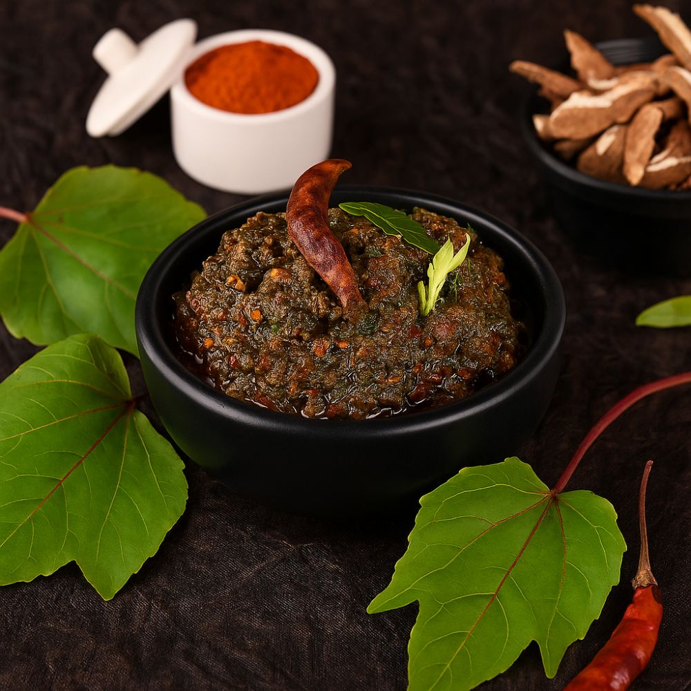 "Homemade gongura nilva pachadi with visible mustard seeds and garlic