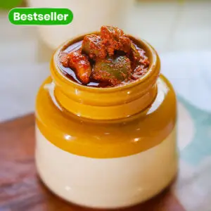 Authentic South Indian homemade mango pickle in glass jar from Nirmala's Home Kitchen