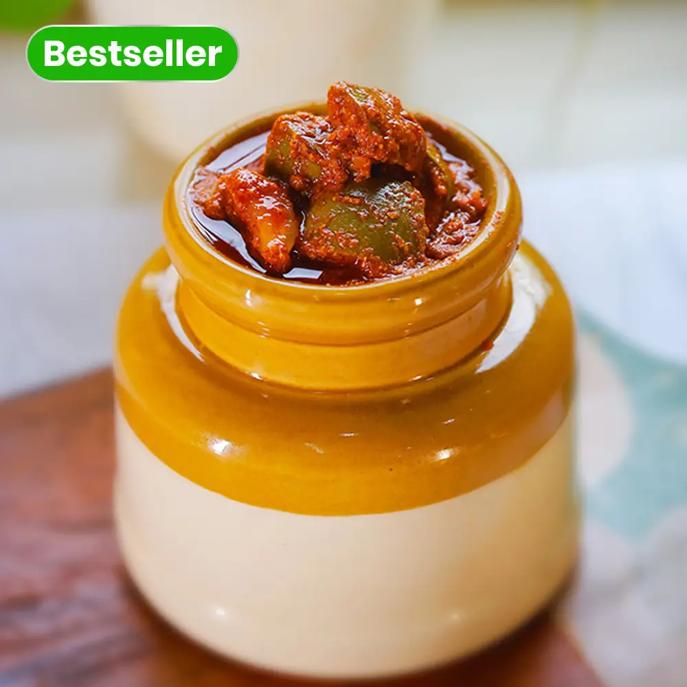 Authentic South Indian homemade mango pickle in glass jar from Nirmala's Home Kitchen
