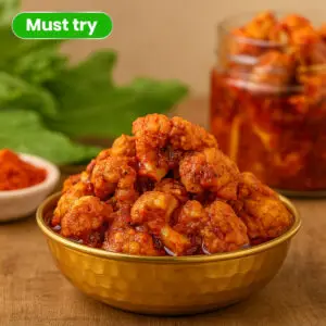 Closeup of cauliflower pickle showing crunchy florets and spice coating